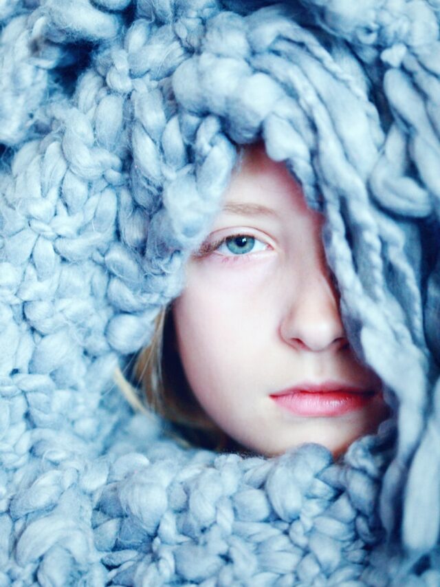 woman with white fur scarf